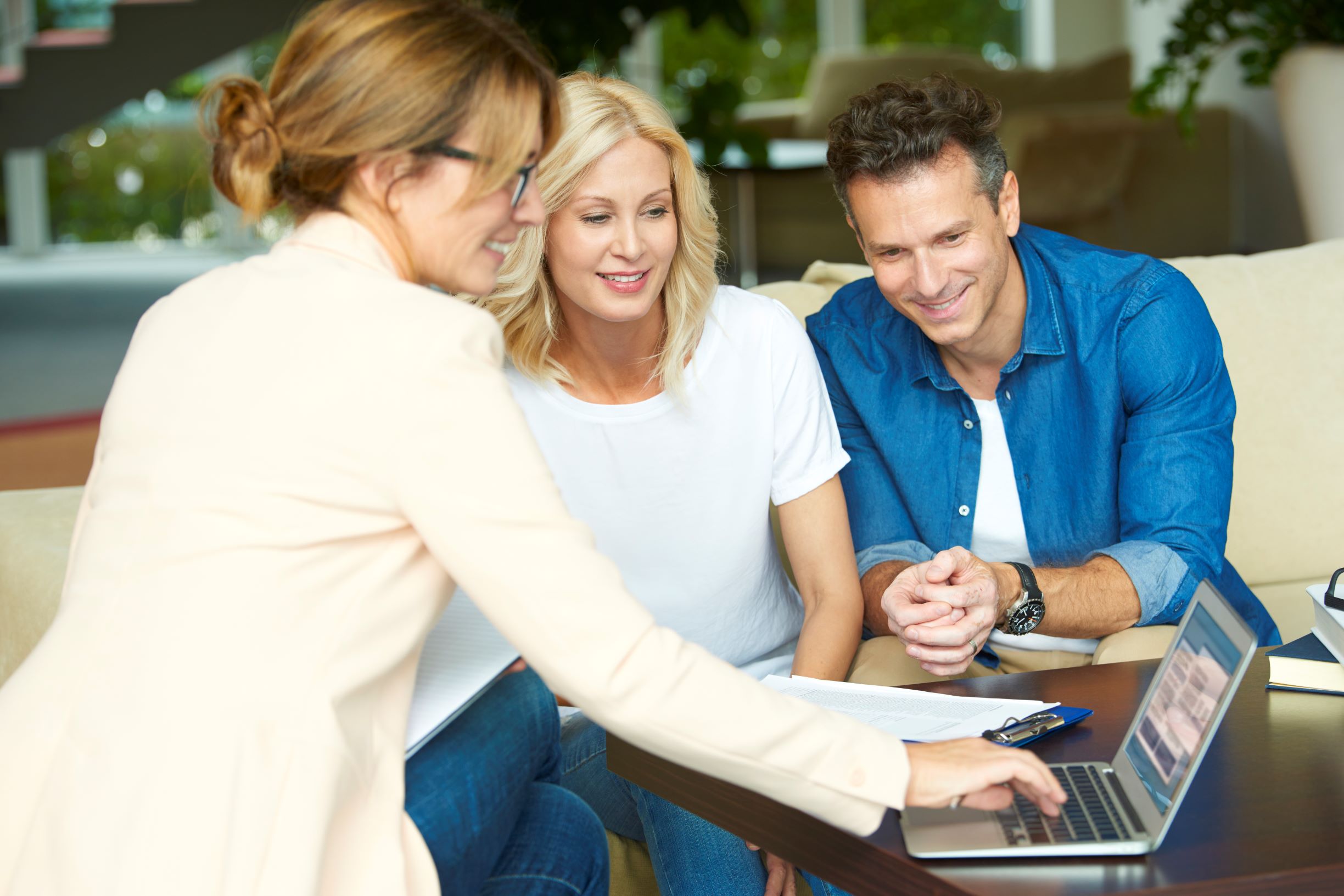 A couple with their advisor having a complimentary consultation